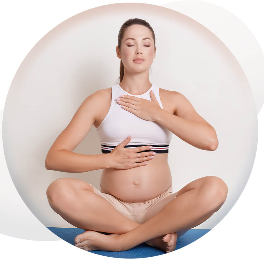 Yoga Instructor doing yoga for pregnancy