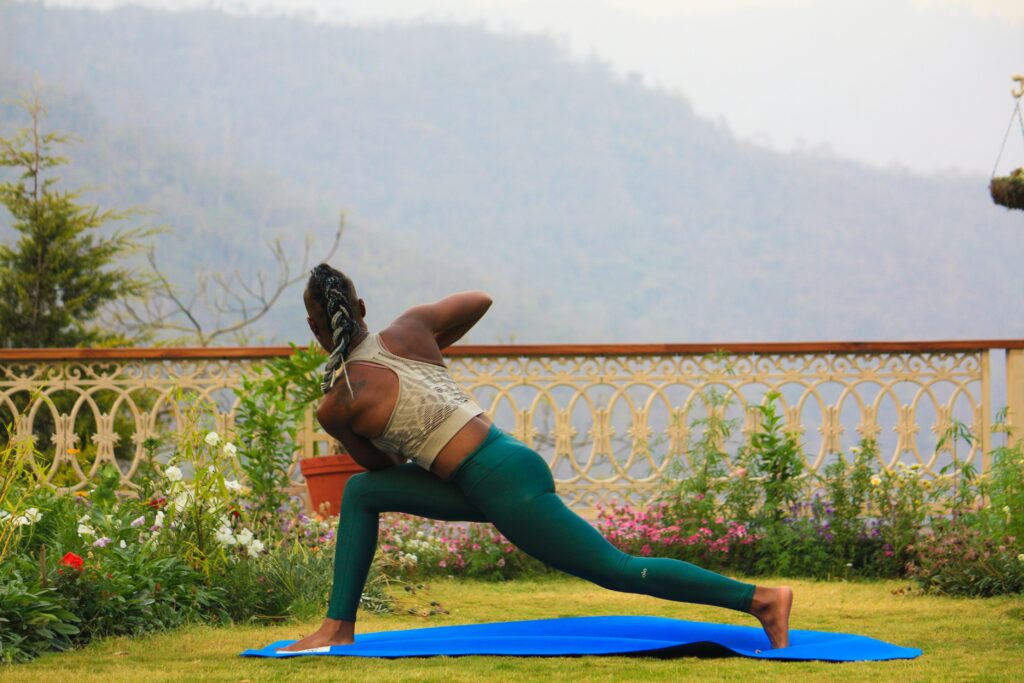 A Women Is Doing Yoga In A Hill Station